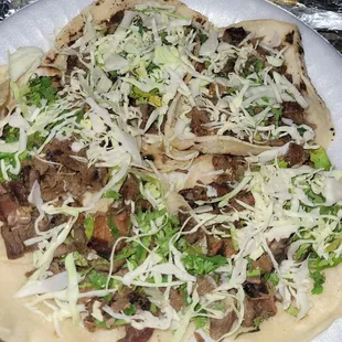 Absolutely LOVE the asada tacos (no onions for me)!! Add green or red sauce for an extra spicy  kick you&apos;ll love!!