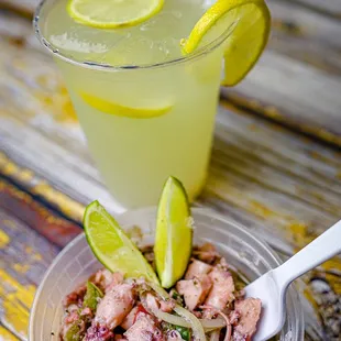 a bowl of food and a drink