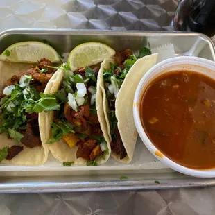 Al pastor tacos and charro beans