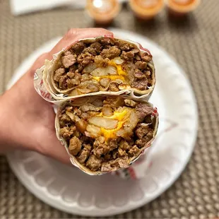 California burrito guts before I drown each bite in their red sauce.