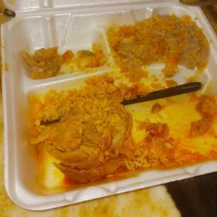 Two chicken enchiladas rice and beans