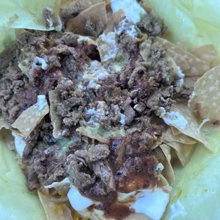 Super nachos looking plain.