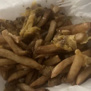 Carne Asada fries!  These fries look like they are a week old all hard and burnt old cheese, I didn't have no sour cream nor guacamole