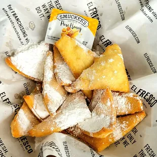 Sopapillas with a side of honey. Taste and texture were awful.
