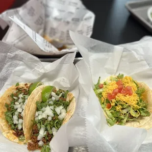 Chorizo tacos on the left. Barbacoa on the right.