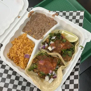 2 taco combo plate (1 chicken 1 steak) with refried beans and spanish rice
