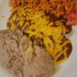 Taco &amp; enchiladas combo... beans &amp; rice not included.