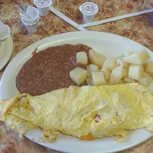 2 egg omelette w/beans and papas. Side of bacon