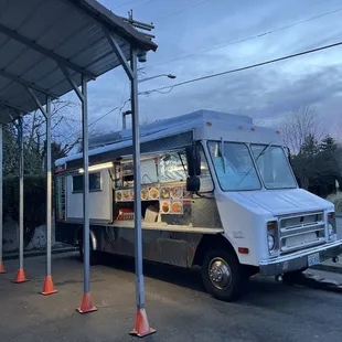 Find this truck at the gas station lot beside its mini mart store