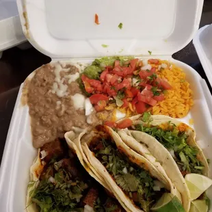 Combo platter with lengua (tongue) tacos.