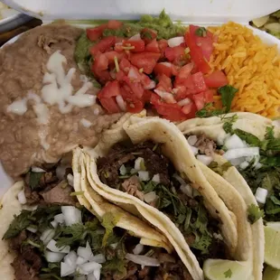 Combo platter with carne asada tacos.