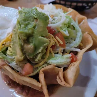 Taco salad w/ beef.  Great toppings, fresh &amp; CRISPY shell!  Yummy!