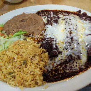 Mole enchiladas.  The sauce is a bit sweeter than I'm used to but still good.