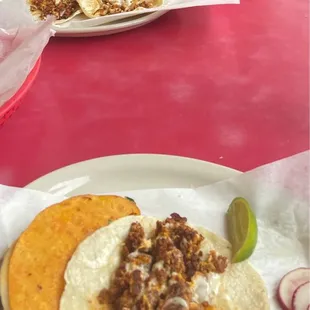 Chorizo egg and cheese on corn tortilla &amp; birria taco