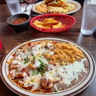 a plate of mexican food on a table