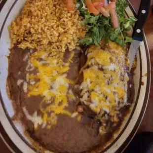 Chili Relleno dinner plate with their authentically prepared  Mexican rice and beans