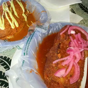 Both sandwiches are good. One has a tangy taste almost like a marinara and the other is a creamier type of sauce.