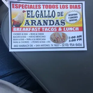 a sign for breakfast tacos and lunch