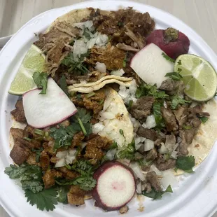 Al pastor, carnitas (middle) and carne asada on the right.
