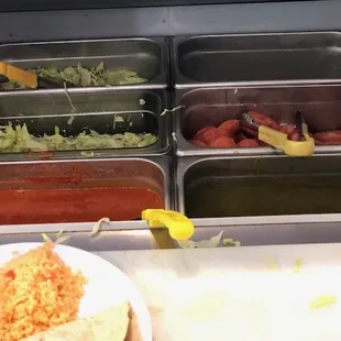 A section of the condiment bar.