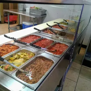 a buffet with many different types of food