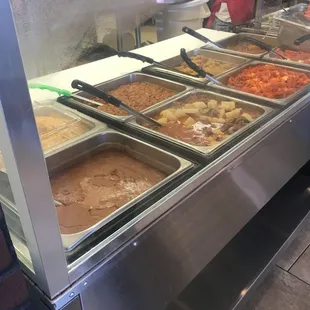 a buffet with a variety of food items