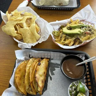 Lunch for two. Burrito Ala Carte, Small Chips Ala Carte, Asada Fries Ala Carte, Quesabirrias Platillo.