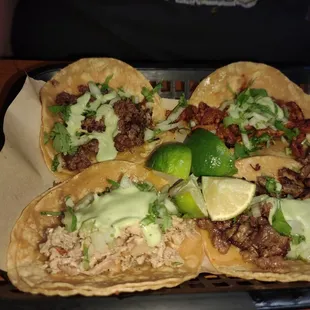4 different street tacos - carne asada, chicken, beef, and pork. Amazing!