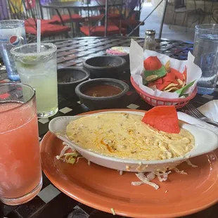 Margaritas and Queso fundido appetizer (melted cheese mixed with chorizo). Yummm