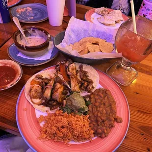 Surf N Turf Fajita Taco Plate on Flour tortillas  Strawberry Pineapple Margarita on the rocks  Corn chips, house salsa &amp; Queso Fundido.