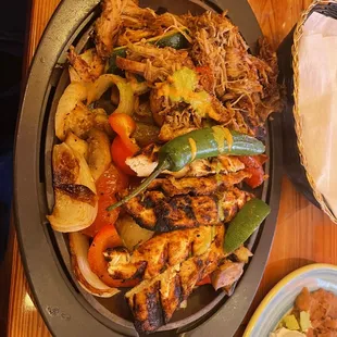 a plate of chicken and vegetables