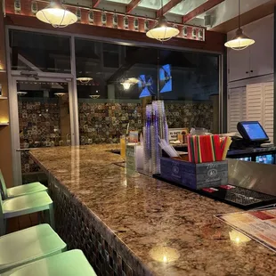 Interior bar surrounded by courtyard