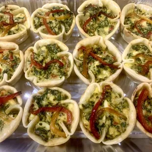 Spinach Cups are our open-face empanadas. A people's favorite!