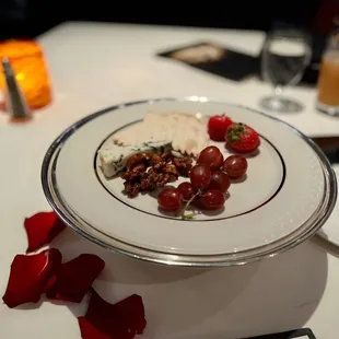 Complimentary after dinner fruits, cheese, nuts, and crackers.