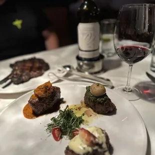 Trio of Steaks special, Bone-In Ribeye, and Delille Cellars D2 wine (perfect pairing)
