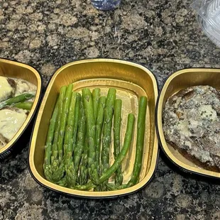 Medallion fillets Oscar style, Asparagus, and Bone in Ribeye