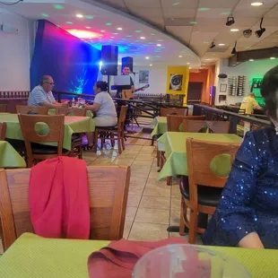 a woman sitting at a table