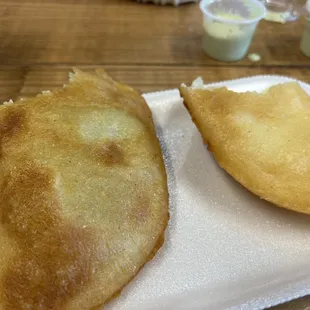 Cheese and beef empanada with garlic sauce