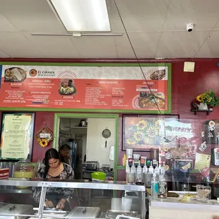 a woman behind the counter