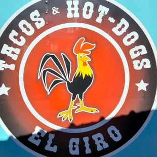 a rooster on the side of the truck