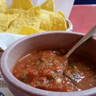 salsa  with a nice kick. Warm chips.