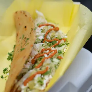 Quesadilla: corn dough with protein of choice, lettuce, sour cream and queso fresco