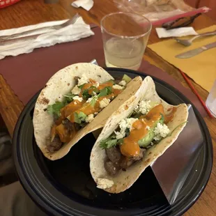 two tacos on a plate