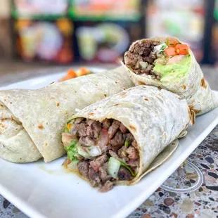 two burritos on a plate