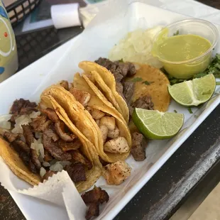 Fajita, steak, and pastor tacos