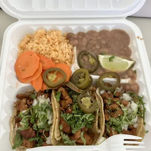 a meal in a styrofoam container