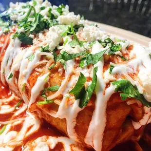 Our wet burrito, made with our house sauce! Come give it a try!!