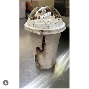 an ice cream sundae with chocolate and whipped cream