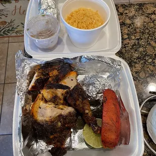 1/2 Chicken special w rice, sausage, corn tortillas, hot sauce.