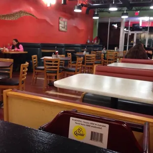 There is a lot of space in the dinning room.